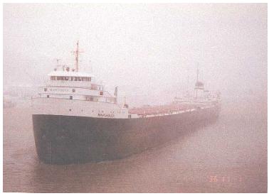 S/S Mapleglen going under the Houghton-Hancock Bridge in whiteout.
