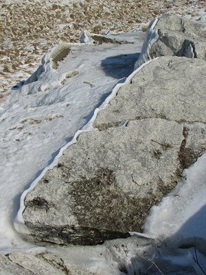 Loved the scalloped snow on the shaded side of this rock!