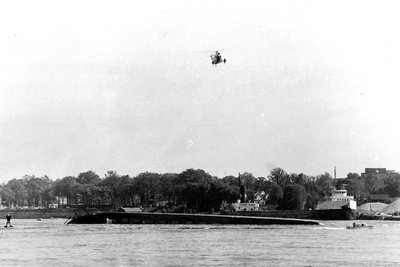 June 5, 1972 - The Sidney E Smith Jr on the bottom of the St. Clair River, Parker Evans which sunk it tied up just downriver, USCG Helo on scene. From my book Collision Under The Bridge
