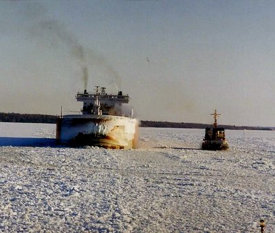 Edger B Speer following the track that the Mackinaw had just broken. USCGC 140 circles the Speer to relieve side pressure of ice on the hull.