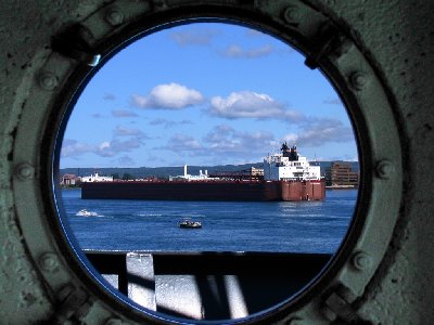 Paul R.Tregurtha as seen through a porthole of the USCGC Mackinaw in Sault St. Marie