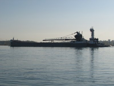 Tug Victory and barge James L. Kuber up-bound to Marquette.