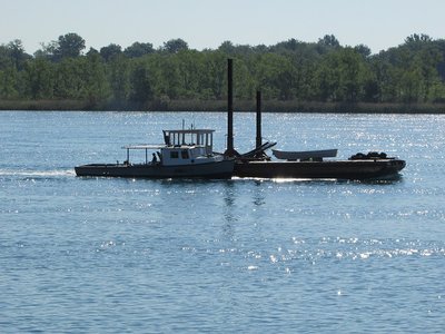 This tiny tug &amp; barge (with no visible name) caught the attention of many along the river.